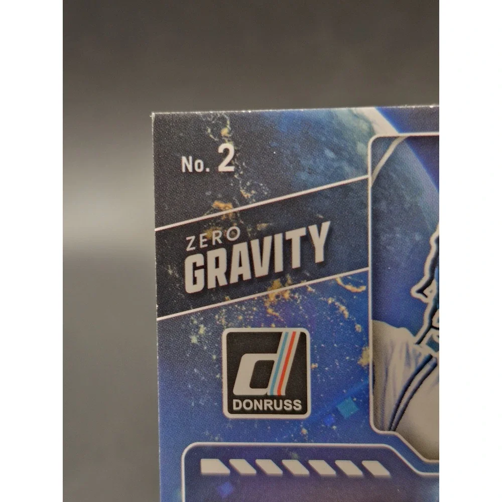 2025-26 Panini Donruss Caleb Holt #2 Zero Gravity Cosmic Purple /299 Wildcats